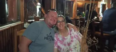 a man and a woman posing for a picture at Snowy Owl in Burgersfort