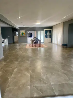 a large living room with a large tile floor at 114 Zinnia Road in Midrand