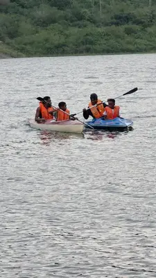 a group of people in kayaks on a lake at Kruger Island Resort in White River