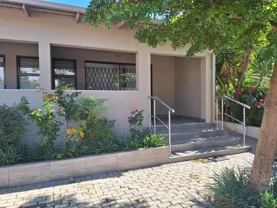 a house with stairs and plants in front of it at Bustani 1 Self Catering Studio Minimum 2 Nights in Edenvale