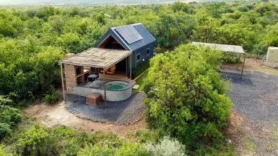 an overhead view of a tiny house with a hot tub at Spasie 30 Harties in Hartbeespoort