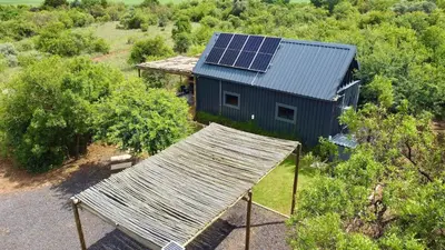 an overhead view of a house with a solar roof at Spasie 30 Harties in Hartbeespoort