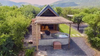 an overhead view of a small house with a roof at Spasie 30 Harties in Hartbeespoort