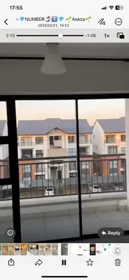 a screenshot of a window with a view of a building at The Blyde lagoon Penthouse in Pretoria