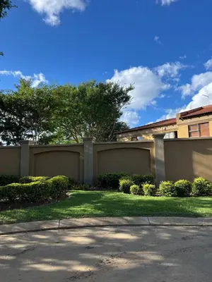 a fence in front of a house at Elephant Springs in Polokwane