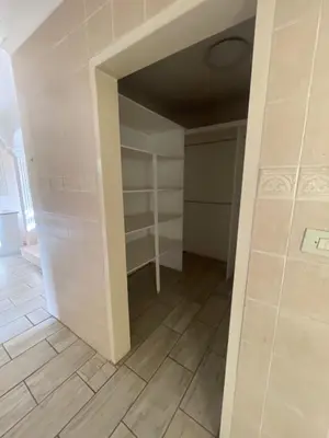 an empty room with a closet in a house at Windsor villa in Pretoria