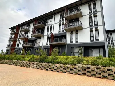 a large building with balconies on the side of it at MAYAMUYE Lifestyles in Nelspruit