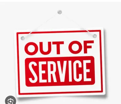 a red and white sign with out of service at Joes in Pretoria