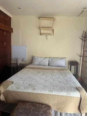 a large bed in a room with at The Palace Guest House in Pretoria