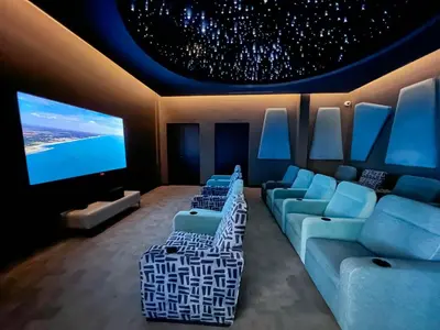 a living room with a couch and a table at Ls apartment in Midrand