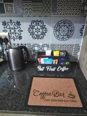 a sign for an office bar on a kitchen counter at Mediterranean Palms in Pretoria