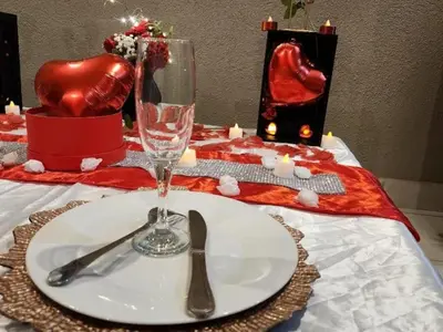 a table with a white plate with a knife and fork at Morning Star Guest House & Lodge in Burgersfort