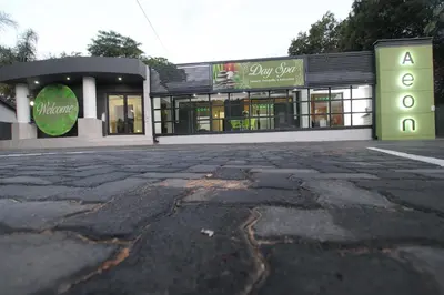 an empty parking lot in front of a store at Aeon Guest House & Spa in Pretoria