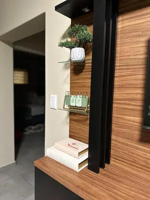 a stack of books sitting on a counter next to a door at Olive view Retreat in Midrand