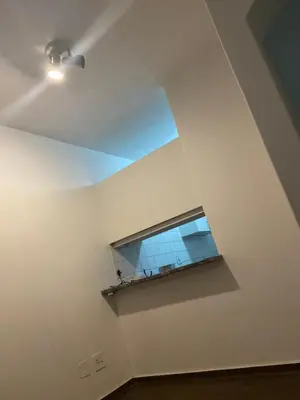 a room with a window in the ceiling at Kim in Pretoria