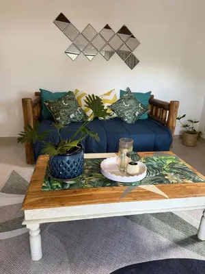 a coffee table in a living room with a couch at Wittus Retreat in White River