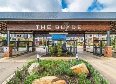 a building with a sign that reads the blible at The Blyde Crystal Lagoon in Pretoria