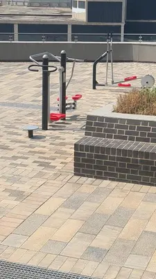 a playground with red frisbees in a park at Stunning 2 bedroom condo at Ellipse Midrand in Midrand