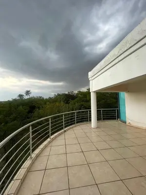 a balcony of a building with a view of trees at Irene Villa in Irene