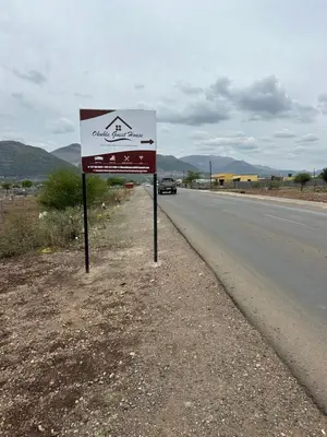 a sign on the side of a road at Okuhle guesthouse in Mahlakwena