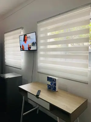 a room with a window with a window blind at Linies guest house in Benoni