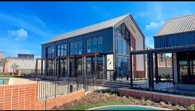a large building with a lot of windows at Ndlovu Lifestyle Apartments in Midrand