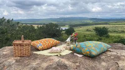 three pillows sitting on top of a rock at Cottage, Eco Estate, private and tranquil in Gatehouse