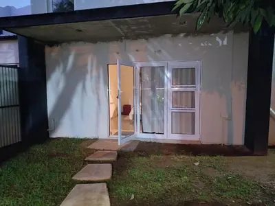 a small house with a door and a window at Grace 523 in Pretoria