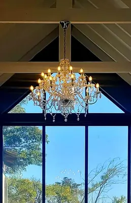 a chandelier hanging in front of a window at Belle Vie Boutique Guesthouse in Pretoria