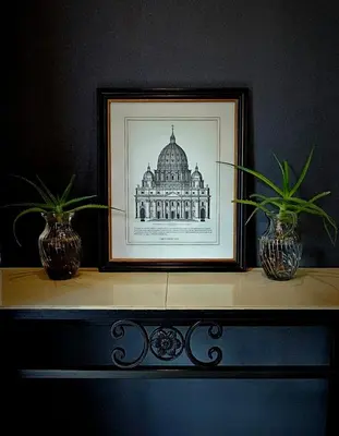 a picture of a building on a table with two vases at Belle Vie Boutique Guesthouse in Pretoria