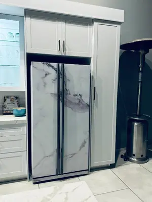 a kitchen with a white refrigerator with marble at Attorneys Place in Pretoria