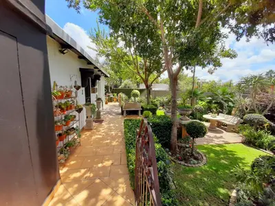 a garden view from the side of a house at At 98 on Lynburn Guest House in Pretoria