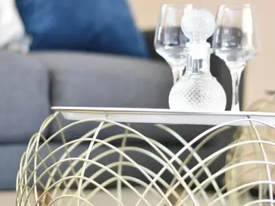 a close up of two glass vases on a table at Mbizo Cozy Retreat- Lofts at Loftus in Pretoria