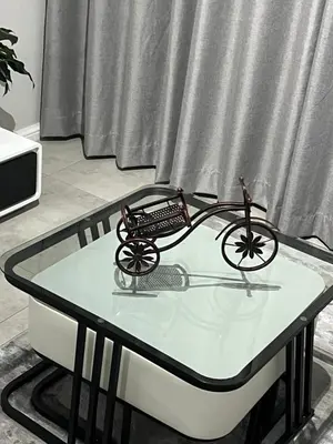 a small bike on a table in a room at The Snug Spot in Boksburg