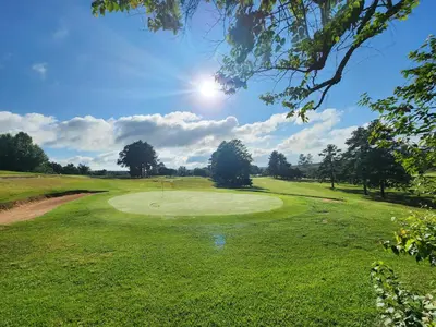 a view of a golf course with a green at Maclarty House - Golf Estate Villa in White River