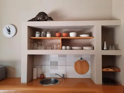 a kitchen with a sink and a counter top at Selfcatering accommodatie Villa BoerenBerg Marloth park, zuid Afrika in Marloth Park