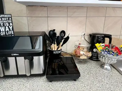 a coffee maker on a counter next to a microwave at Labacht Home with The view in Dullstroom