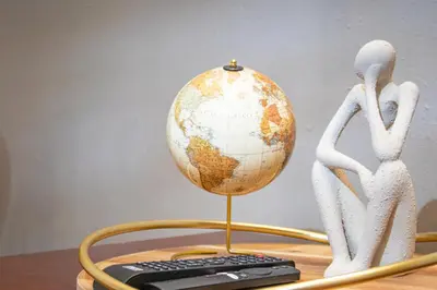 a statue of two people standing next to a globe at Amani Peaceful Home in Centurion