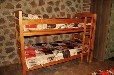 a couple of bunk beds in a room at Thaba Tshwene Game Farm in Modimolle