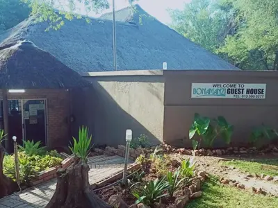 a building with a sign for akwuri first house at Bonamanzi Guesthouse in Burgersfort