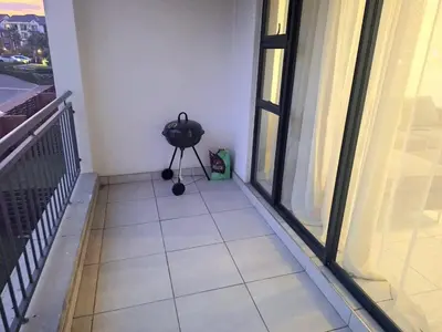 a room with a tripod next to a window at KD Homes in Pretoria
