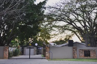 a house with a gate in front of it at StayFit 02 in Polokwane