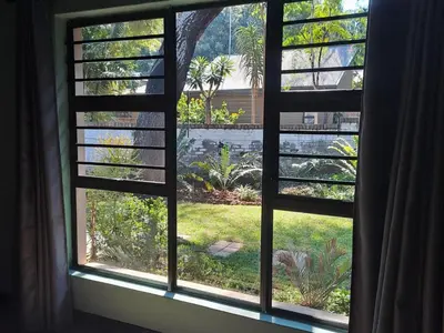 an open window with a view of a yard at Stayfit 03 in Polokwane