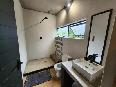 a bathroom with a sink and a toilet at Hartbeest Bush Stay #26 in Kosmos