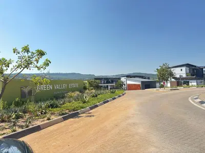 an empty road in front of a building at Rachels Haven in Boschrand