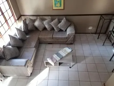 an overhead view of a living room with a couch at Pandleberry in Warmbaths