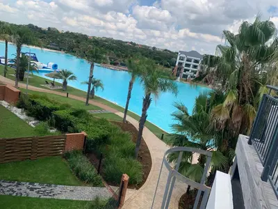 a view of a swimming pool from a balcony at The Blyde Siesta in Pretoria