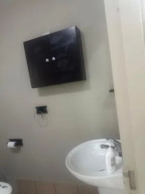 a bathroom with a sink and a medicine cabinet at Bytes - Waterberry Mbombela in Nelspruit