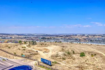 a view of a city from the top of a hill at Celestial Cassini Cove at The Ellipse in Midrand