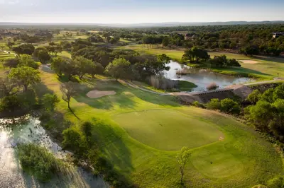 an overhead view of a golf course with a river at 36 on EAGLE DRIVE in Modimolle